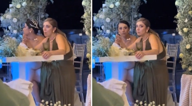 Κατάπιαν και τα… πιρούνια: Νύφη και κουμπάρα ξεσκίζονται στο φαγητό μόλις σχολάει ο… γάμος και γίνονται viral (video)